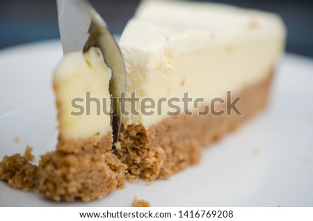 A picture of a cheesecake dessert on the table