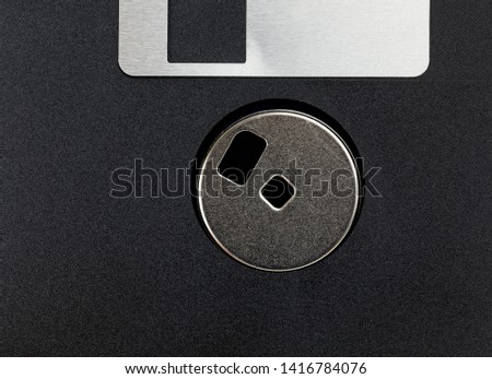 old black plastic floppy disk to store information on the first computers for personal use