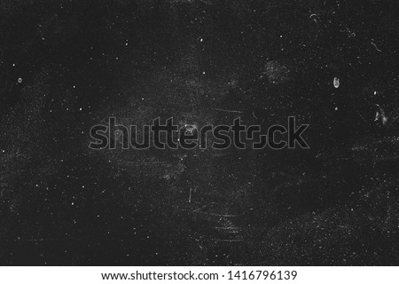 Dust and scratches design. Aged photo editor layer. Black grunge abstract background. Copy space. Royalty-Free Stock Photo #1416796139