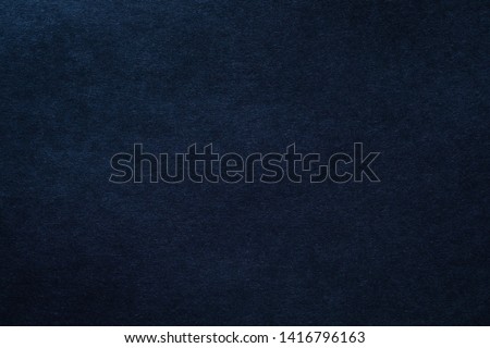 Dark blue felt texture abstract art background. Solid color wool textile. Copy space. Royalty-Free Stock Photo #1416796163