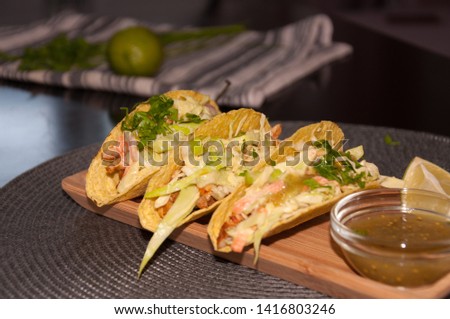 Mexican food. Delicious Tacos Honey Mustard Chicken with Cole Slow Salad and Salsa Verde Sauce
