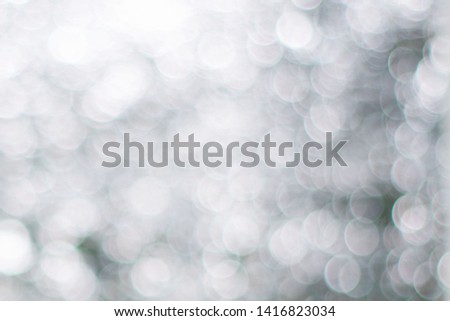Blurred view of abstract silver background. Bokeh effect