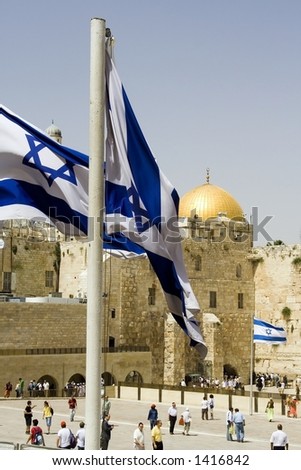 Very symbolic picture of Jerusalem. Israeli flags, the western wall, and the golden dome mosque