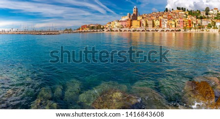 Panoramic view of colorful old town and beach in sunny Menton, perle de la France, on French Riviera, France