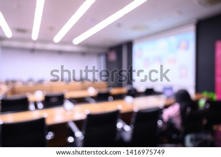 Blurred background of conference hall or seminar room.