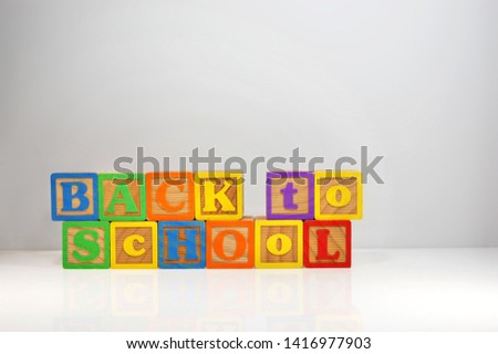 Back To School spelled out with ABC blocks.