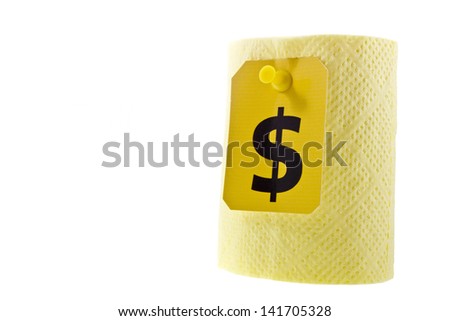 Yellow toilet paper roll with a yellow label and black dollar sign in it on a thumbtack. Inflation concept with a toilet paper/ Inflation concept