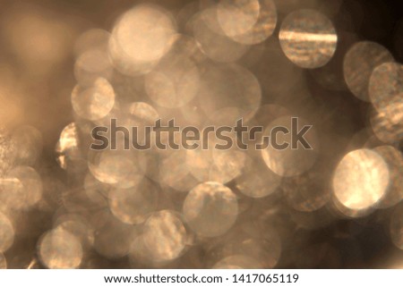 Golden Abstract bokeh light effect on background
