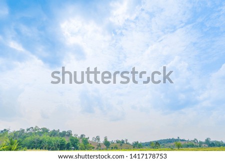 Beautiful Blue Sky Background with White Clouds and Mountain. Picture for Summer Season.