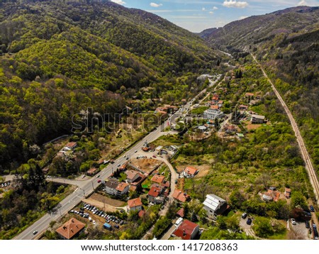 Aerial photography over the main road going between the mountains