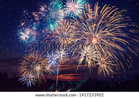 colorful fireworks on the night sky background. Royalty-Free Stock Photo #1417233902