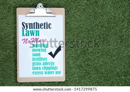 Synthetic lawn benefits sign on synthetic lawn