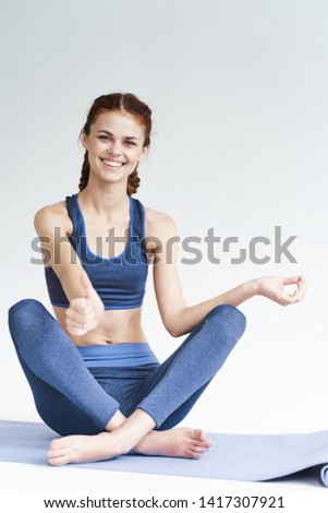 Sports woman engaged in gymnastics exercise training class meditation