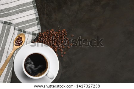 Coffee cups and nuts on the table Top view with copyspace for your messages