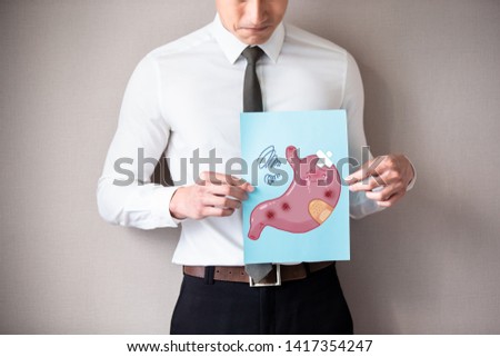 businessman with healthy stomach and feel worry