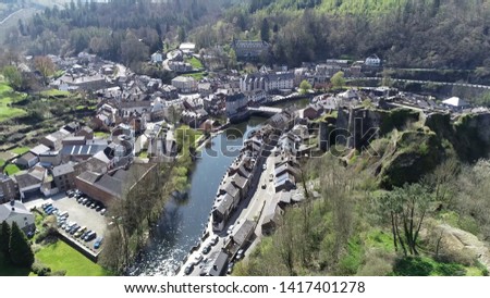 Aerial picture of La Roche en Ardenne and in background two people in kayak moving over Ourth river located in Belgium this town is one of most popular tourist destinations in Ardennes