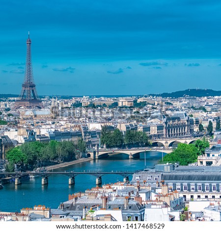 Paris, panorama of the Eiffel tower, with the Seine and bridges, and the most famous monuments 
