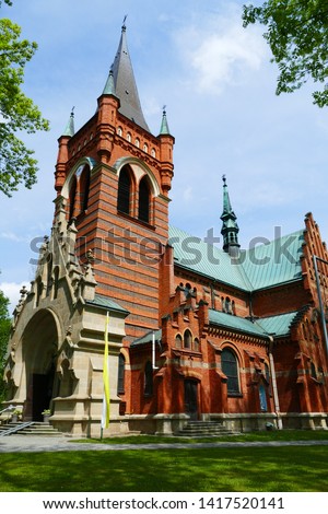 Church of St. Peter and Paul, Poręba Radlna, district Tarnów County, Lesser Poland Voivodeship, in southern Poland. Royalty-Free Stock Photo #1417520141