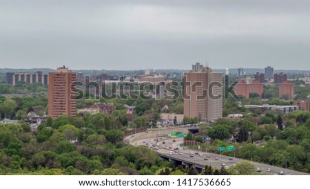 A Compressed Cityscape Shot of South Minneapolis and Highway Traffic on a Gloomy Spring Day