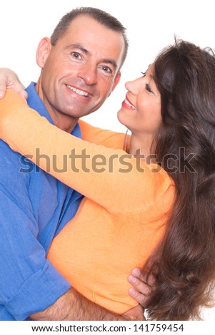 Happy couple in front of white background