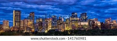 Modern night time shot of  downtown skyline full of skyscrapers - Calgary, Alberta Canada. New symbol of Calgary downtown is visible far left - Bow Building (Encana building). Royalty-Free Stock Photo #141760981
