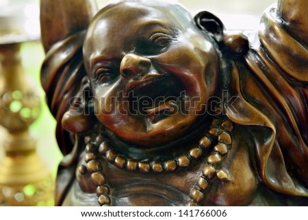 buddha statue happy and smiling