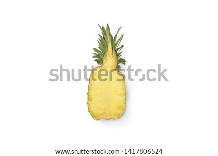 half of ripe juicy pineapple isolated on white background.