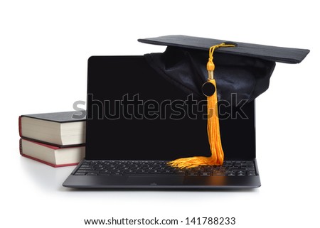 graduation cap and laptop