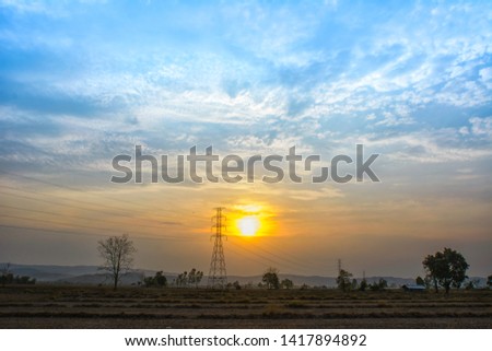 Sun set at electric pole in morning