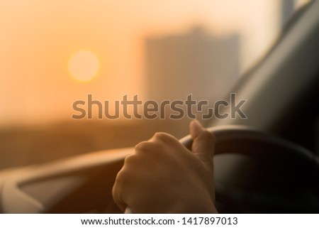 Sunset drive on the Expressway Royalty-Free Stock Photo #1417897013