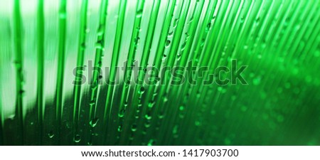 Abstract lines with fresh water drops backdrop. Neon colors polycarbonate hothouse roof texture.