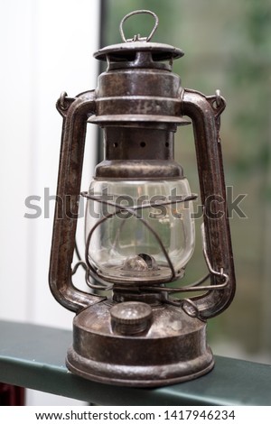 A single tradition kerosene lamp or paraffin lamp is on shelf in the antique lamp collection in vietnam, the original vietnam lamp in the past. Royalty high quality free stock image of Ancient.