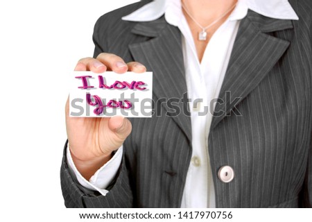 Man's hand showing love card on white, love massage, top view