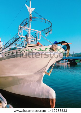 a South Korean fishing boat settling in a port