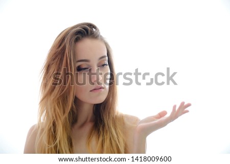 Photograph of a portrait of a beautiful fashionable beauty woman girl with long dark flowing hair, isolate on a white background. She is standing in different poses and smiling. Made in studio