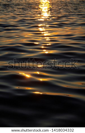 Sun glare on water at calm Adriatic sea