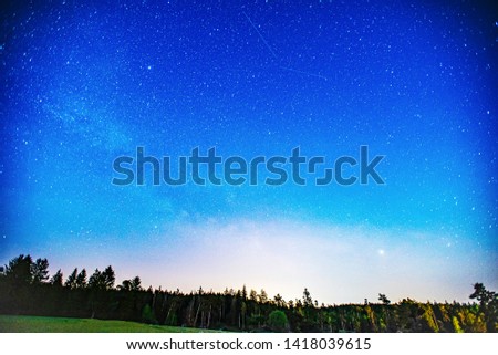 Summer Milky Way with Jupiter planet in the night sky.