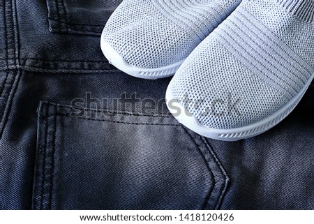 fashionable gray women's shoes on a free background, a place for an inscription on the background near the actual shoes