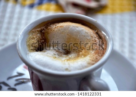 Italian milk coffee close up