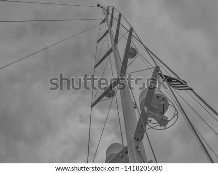 Tall Ship Sailboat Mast.  Mega yacht sailboat mast with overcast skies above.
