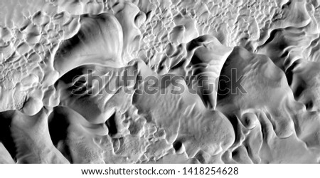 wind sculptures, allegory, abstract naturalism, Black and white photo, abstract photography of landscapes of the deserts of Africa from the air, aerial view, contemporary photographic art, 