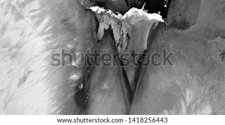 unstoppable,, black gold, polluted desert sand, black and white photo, abstract photography of the deserts of Africa from the air, aerial view, abstract expressionism, contemporary photographic art,