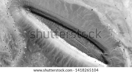 Virgin, allegory, abstract naturalism, Black and white photo, abstract photography of landscapes of the deserts of Africa from the air, aerial view, contemporary photographic art, 