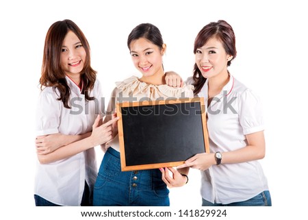Three Girl Holding Chalkboard
