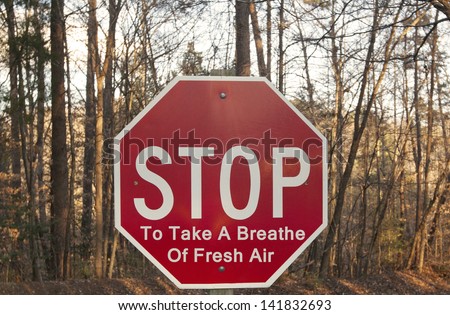Stop To Take A Breathe Of Fresh Air sign Royalty-Free Stock Photo #141832693