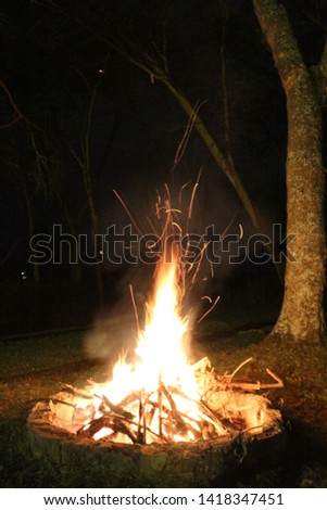 Bonfire at night with amazing light night fire with sparks 