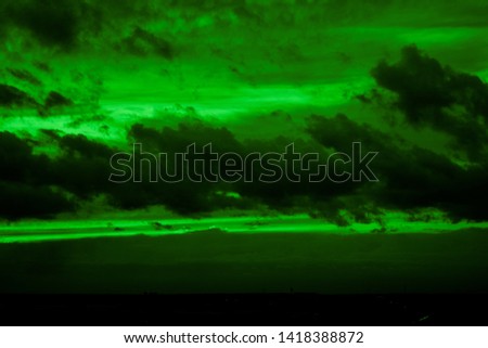 Dark green clouds at sunset. Nature of North Asia