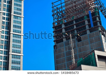 modern glass and steel office buildings low angle view at Jakarta, Indonesia