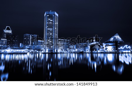 Black and white image of the Baltimore Inner Harbor Skyline at night
