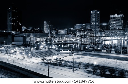 View of the Baltimore Inner Harbor and skyline during twilight from Federal Hill.